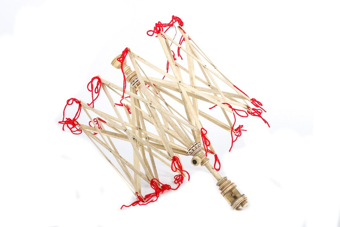 WHALE BONE SWIFT: SWIFT, Very good scrimshaw yarn winder. Nice turnings and swift is in overall very good condition. 18" overall.