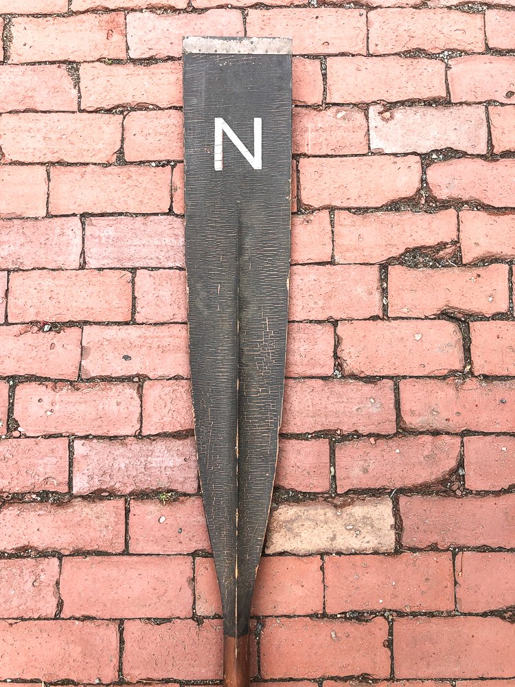 PAINTED "N" CREW OAR: Original copper and paint. Marked with an "N". 12' 2" long