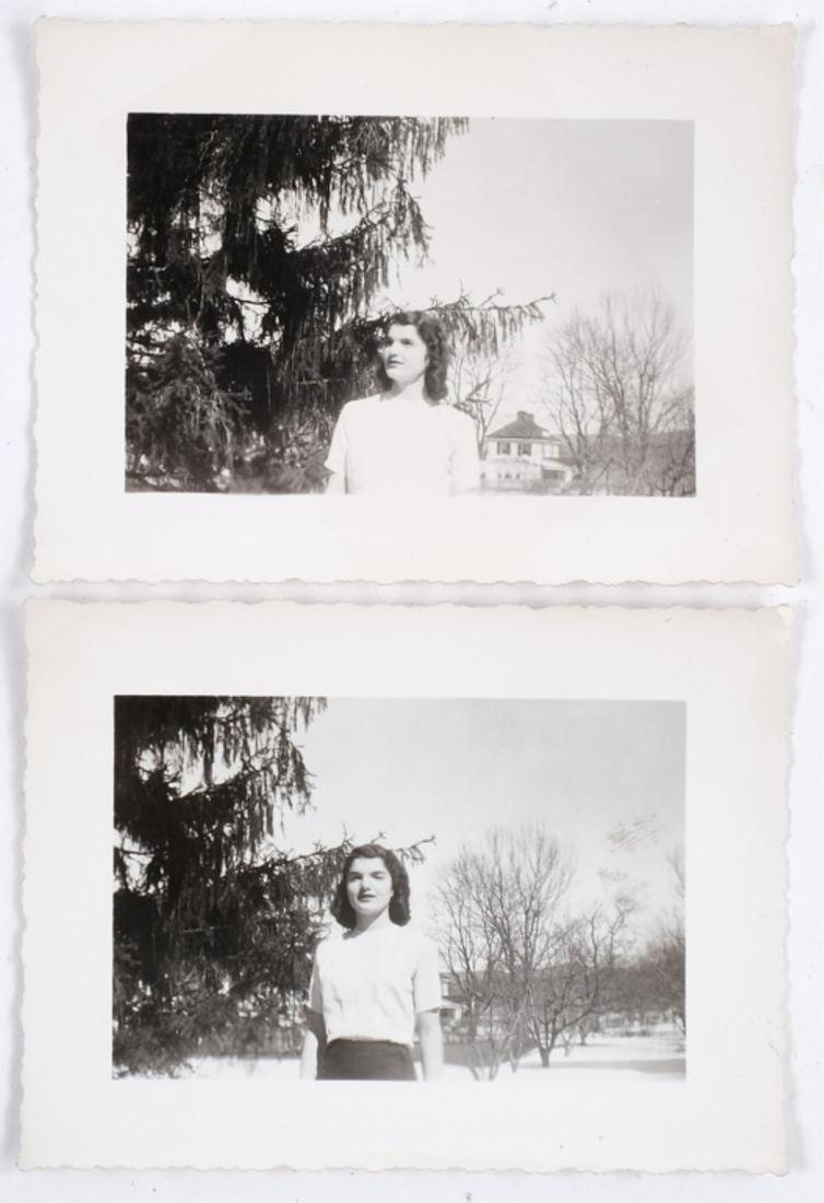 JACKIE BOUVIER at MISS PORTER: (2) Unpublished black and white snap shots of Jackie standing out of doors on a winter's day. 3 x 4 1/4 inches. Provenance: Hammersmith Farm, Newport, Rhode Island