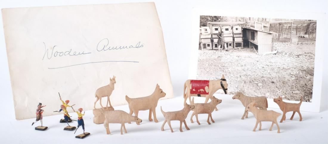 JACKIE BOUVIER with SILVER PHEASANT IN HEN YARD: Unpublished black and white photograph 3 1/2 x 4 1/2 inches. Together with (9) carved and painted miniature animals,(4) tin/ lead keepers and a "Wooden Animals" envelope from Jackie's days at Hammersm