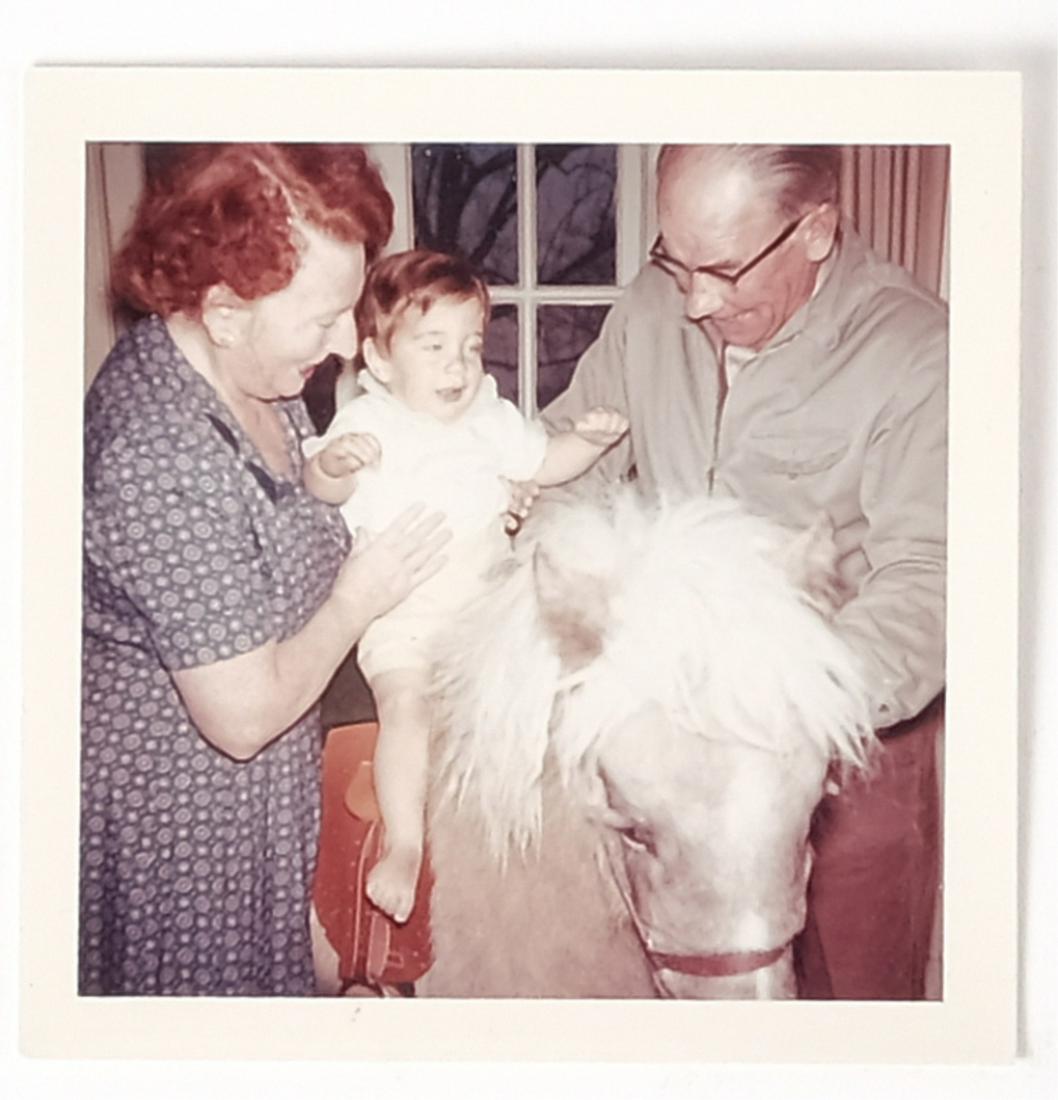 1961 JOHN JOHN on PONY inside HAMMERSMITH FARM: Somehow the pony appears to be in the house. John is with Maude Shaw (his nanny) and gentleman. 3 x 3 inch color unpublished photograph. Provenance: Hammersmith Farm, Newport, Rhode Island