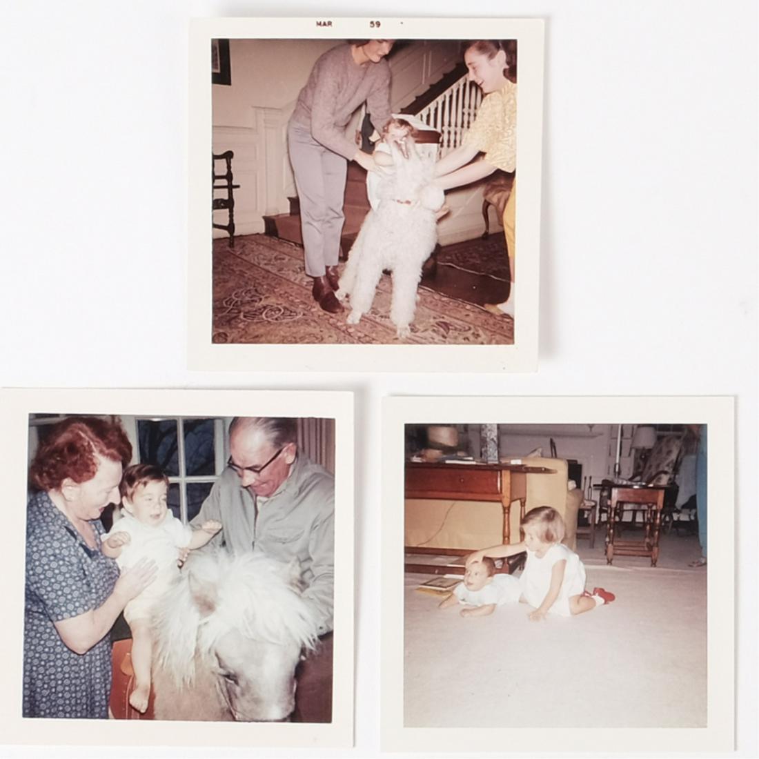(3) EARLY SNAPSHOTS of JACKIE JOHN JOHN & CAROLINE: Including: Caroline (16 months) at Hammersmith Farm being placed on a poodle by Jackie dated March 1959, John F. Kennedy, Jr. being placed on pony by Nancy Maud Shaw and a gentleman together with Caro