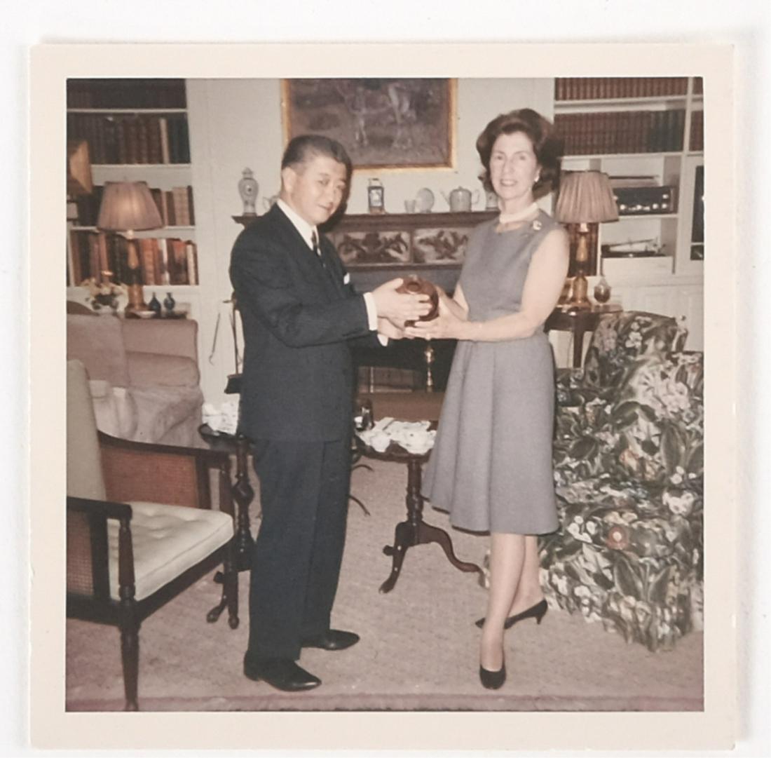 JAPANESE AMBASSSADOR to the US RYUJI TAKEUCHI: at Hammersmith Farm presenting gift to Janet Lee Auchincloss in 1966. color photograph 3 x 3 inches.Provenance: Hammersmith Farm, Newport, Rhode Island