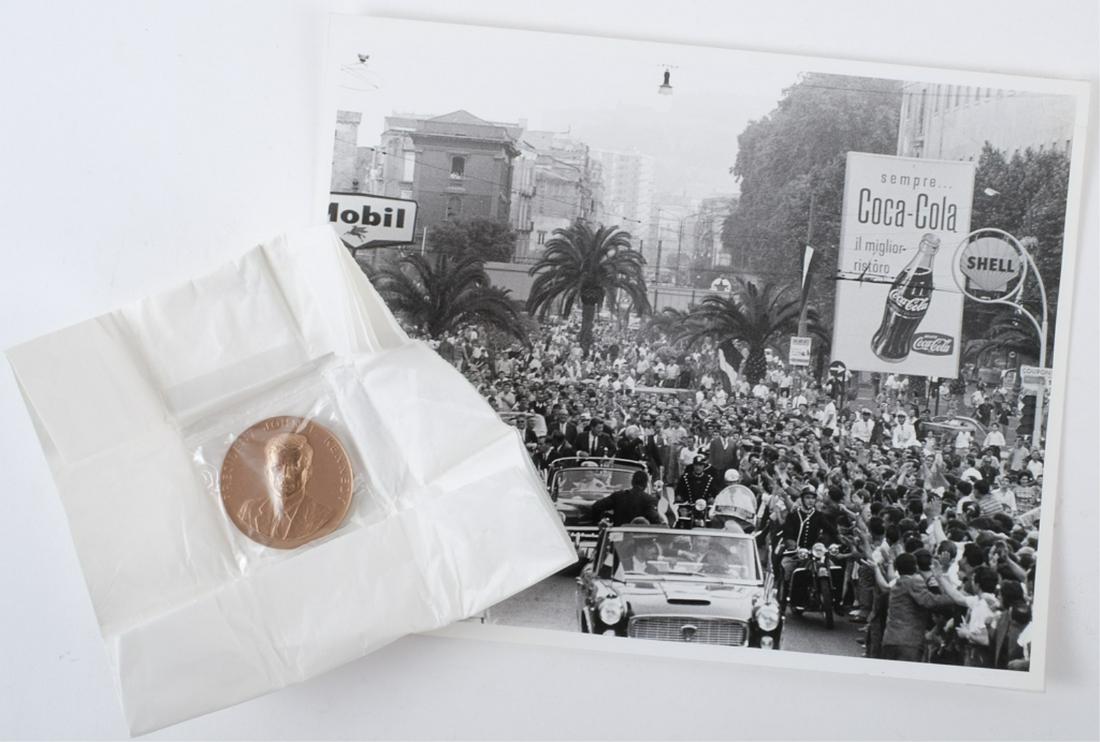 1963 JOHN F. KENNEDY EUROPEAN TRIP NAPLES: Rare Bronze J.F.K. appreciation medal 1 3/4 inches 1 of 300 medals produced. Together with an 8 x 10 inch black and white photograph of Kennedy parading through Naples, July 2, 1963. Note: Dave Powers
