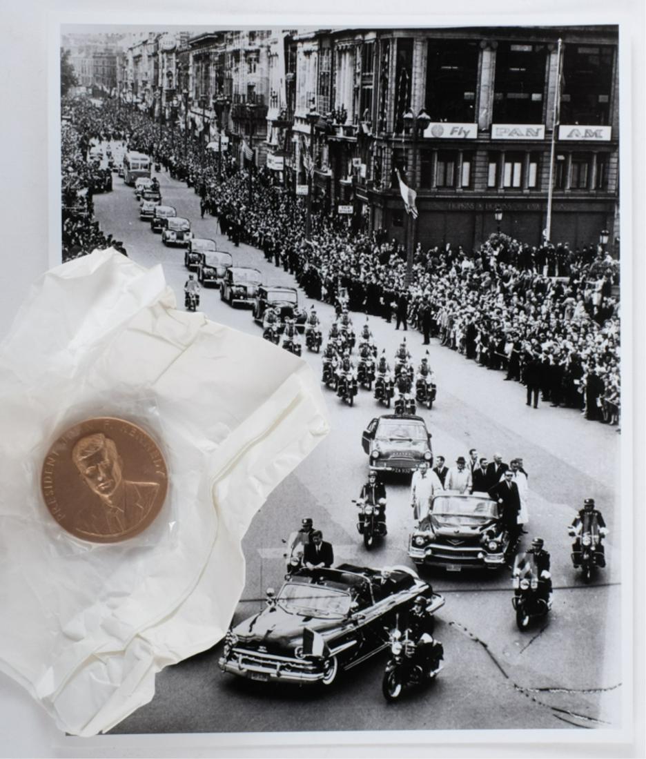 1963 JOHN F. KENNEDY EUROPEAN TRIP DUBLIN: Rare Bronze J.F.K. appreciation medal 1 3/4 inches 1 of 300 produced. Together with an 8 x 10 inch black and white photograph of Kennedy parading through Dublin, Ireland, June 26, 1963. Note: Dave Pow