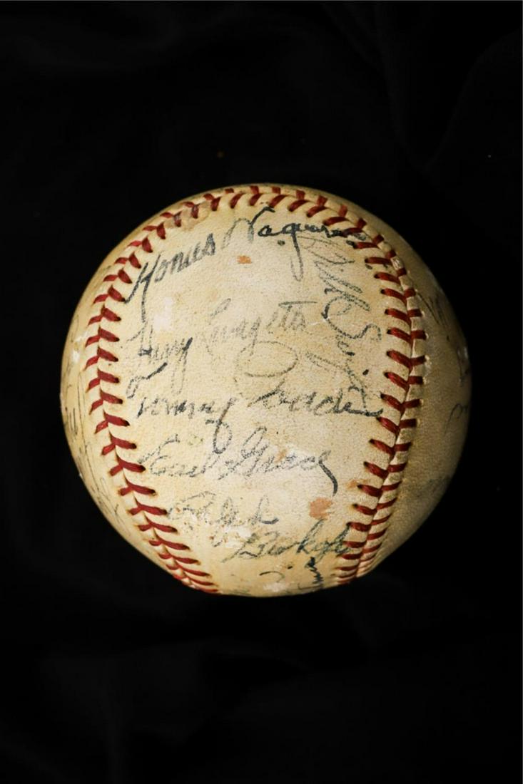 1935 PITTSBURGH PIRATES MULTI-SIGNED BASEBALL: Reach Official American League Ball baseball with red stitching and (22) Pirate signatures (5) of which being Hall of Fame members including: coach Honus Wagner (HOF), Pie Traynor (HOF), Wait Hoyt (HO