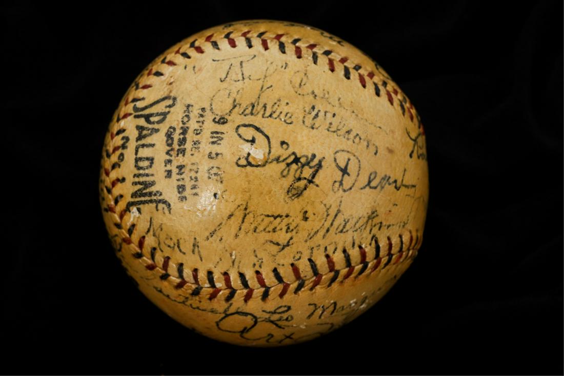 1932 CARDINALS & BRAVES MULTI-AUTOGRAPHED BASEBALL: Spalding National League baseball with blue and red stitching and (15) Cardinal and Braves signatures, (3) of which being Hall of Fame members including: St. Louis Cardinal Joe Medwick (HOF), Dizzy De