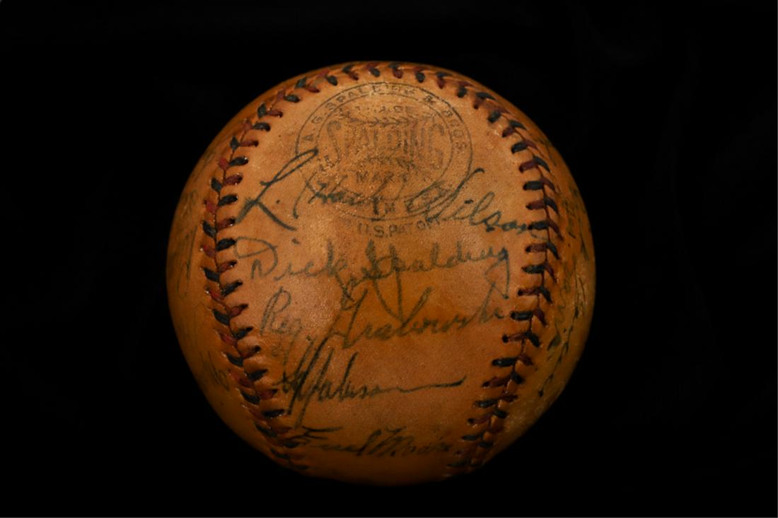 1934 PHILLIES MULTI-AUTOGRAPHED BASEBALL: Spalding Official National League baseball with red and blue stitching and (20) signatures, (1) of which being a Hall of Fame Member including: Hack Wilson (HOF), Al Todd, Dolph Camilli, Ethan Allen,