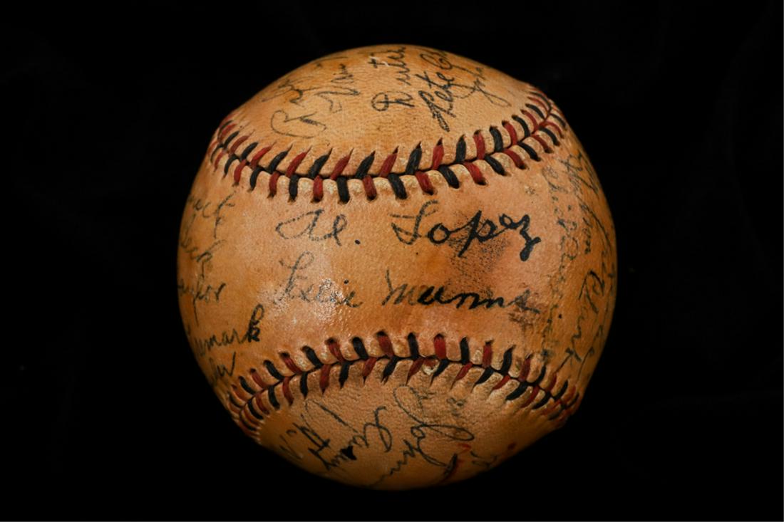 1934 BROOKLYN DODGERS MULTI-SIGNED BASEBALL: Spalding Official National League baseball with blue and white stitching and (25) Dodger signatures (2) of which being Hall of Fame members including: Al Lopez (HOF), manager Casey Stengel (HOF), Les 