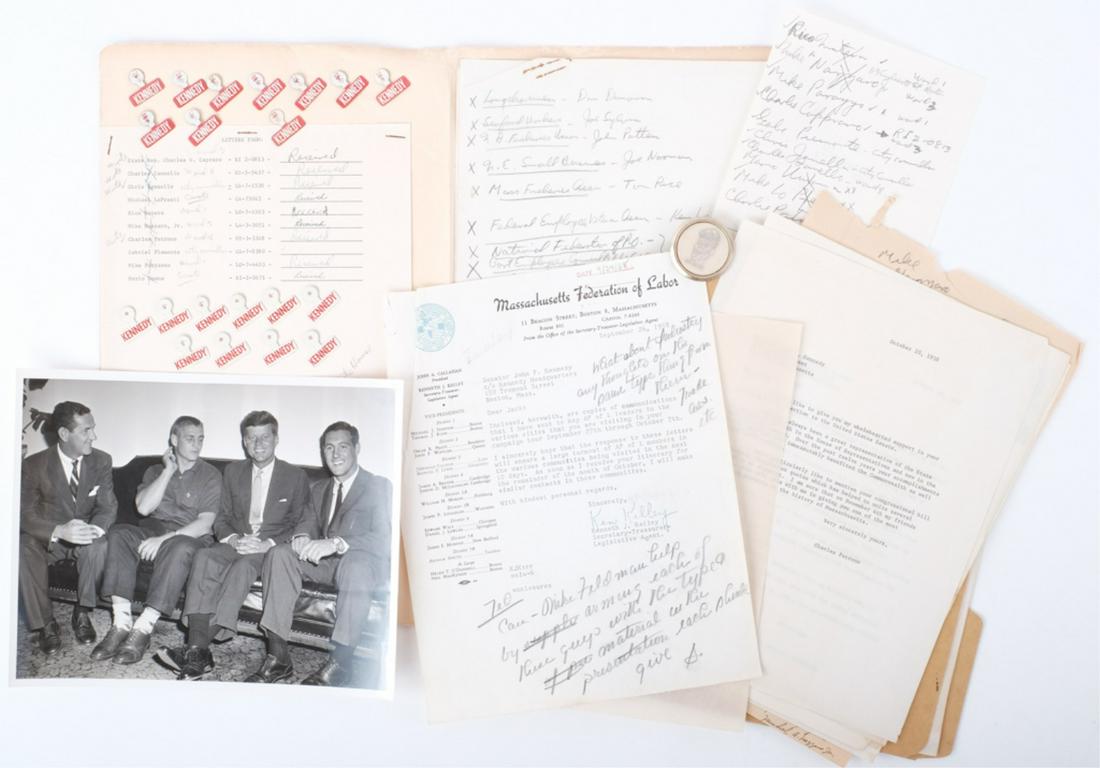 SENATOR JOHN F. KENNEDY CAMPAIGN MATERIAL: (20) Red and white Kennedy lapel tabs, Round Sen. Kennedy tie clip, and a file of endorsements for the Italian American Reps and City Councilors including an 8 x 10 inch photograph of John F. Kennedy 