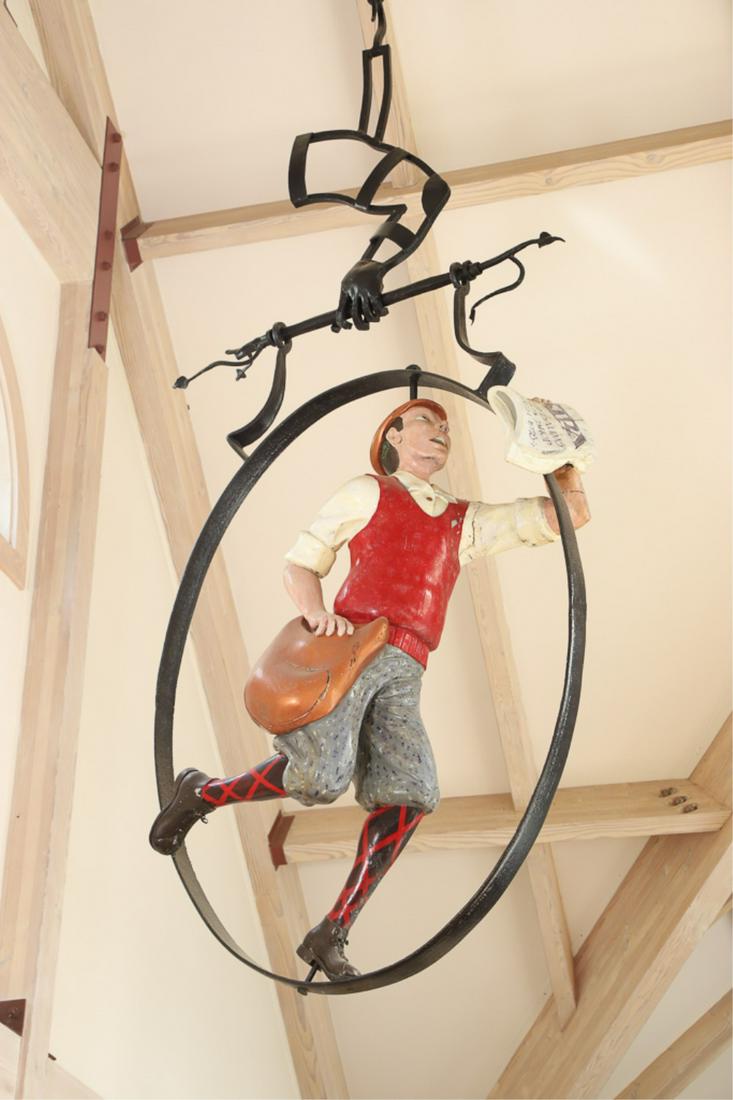 ICONIC WINEBAUM'S NEWS SHOP PORTSMOUTH TRADE SIGN: Carved and painted wood by Portsmouth woodcarver/ sign maker Steve McHenry in 1978 before he went to Boston Architecture College the following year. Figure 56 inches. Iron frame 72 inches. Together wi