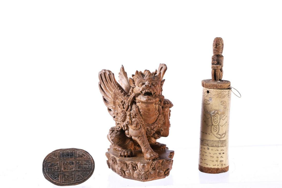 (3) ETHNOGRAPHIC WOODEN CARVINGS: Including: Indonesian Dragon, carved stamp, and a figural scroll holder. 9 1/2 inches (and under)