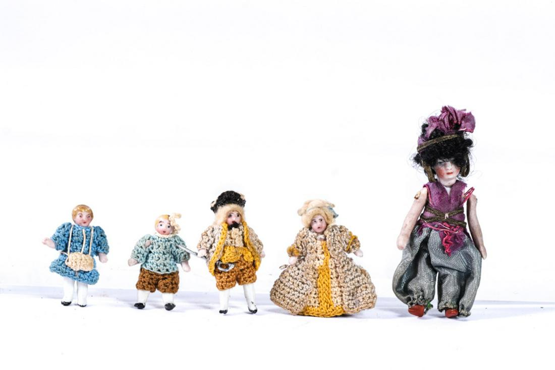 (5) MINIATURE FRENCH / GERMAN BISQUE DOLLS: Including: Arabian and Colonial outfits. 2 3/4 - 1/4 inches.