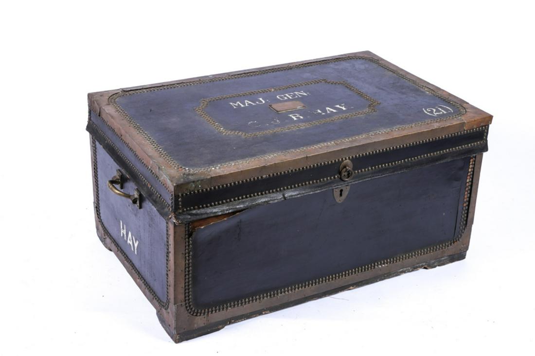 MAJOR GENERAL C.J.B. HAY'S BRASS BOUND CHEST: Camphor wood chest brass tacked and bound chest with collapsing brass handles all raised on boards. 16 1/2 x 33 x 21 inches. Note Major General Hays served in the second Boer War in South Africa.