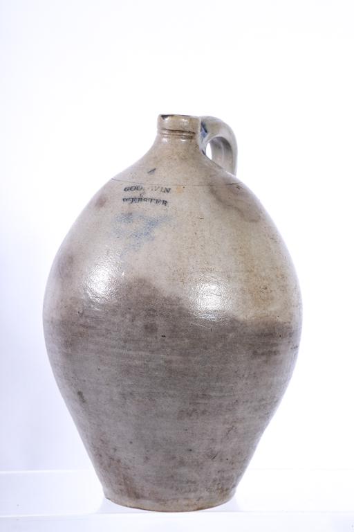 GOODWIN & WEBSTER (4) GALLON STONEWARE JUG: Embossments and handle lighted in cobalt. 18 1/2 inches