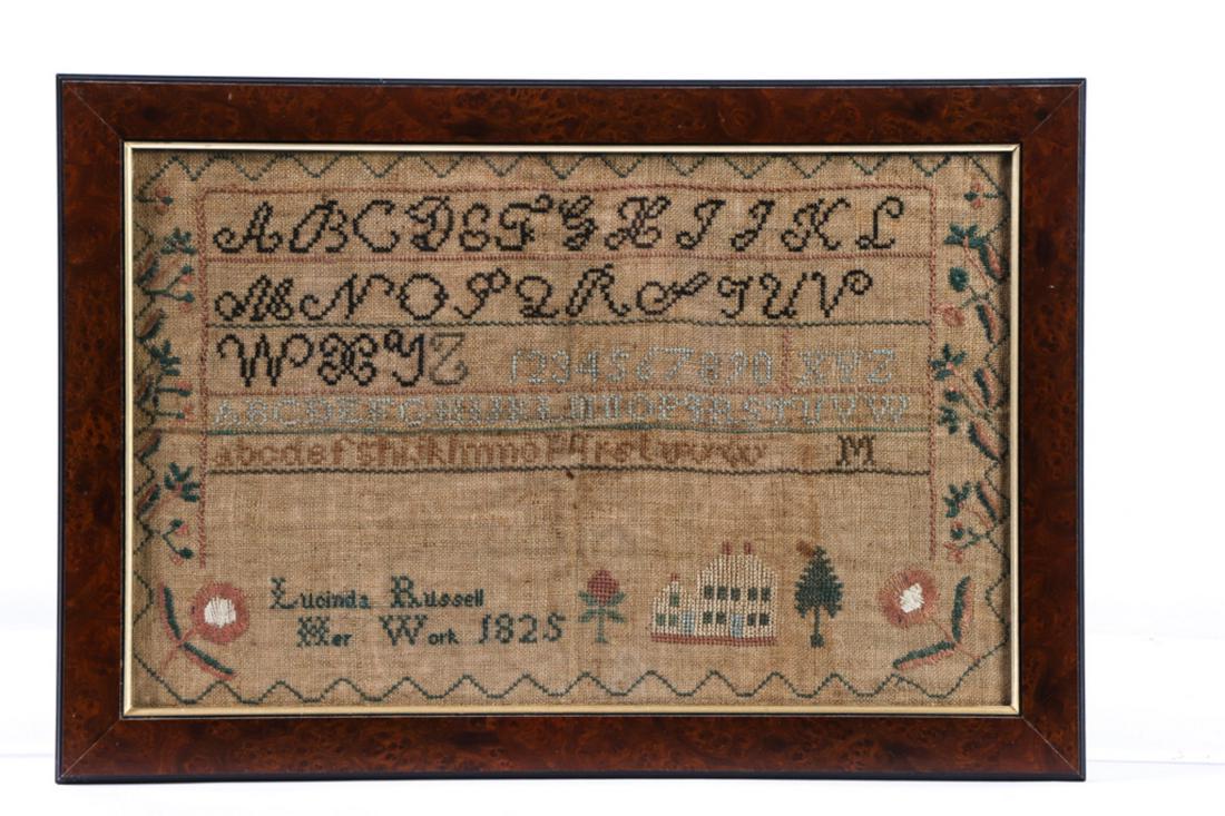 LUCINDA RUSSELL BELFAST MAINE SAMPLER DATED 1825: Alpha-numeric sampler with running border in-filled with with flowers, house, flowers and tree. silk on linon. framed 13 1/4 x 19 1/4 inches (overall)