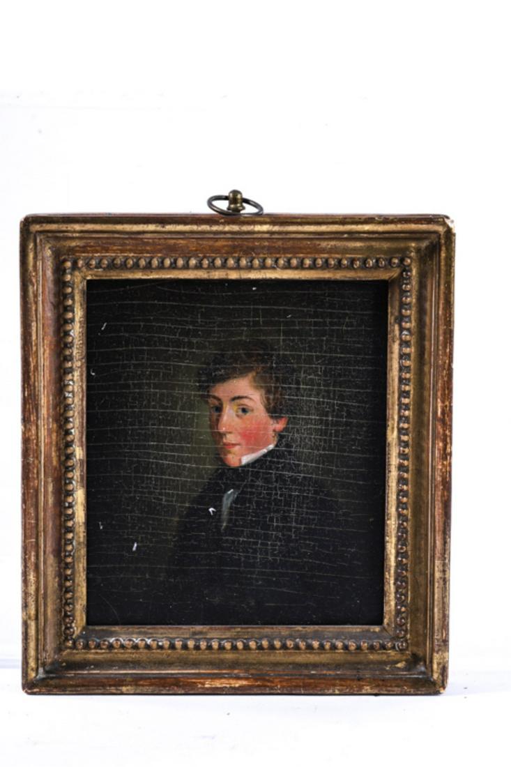 ENGLISH SCHOOL (19th c) PORTRAIT OF A YOUNG MAN: Oil on panel 6 x 4 1/2 inches. framed. 7 x 6 1/4 inches. (A label on the back attributes this work as being a self-portrait by George Vincent (1796-1832))