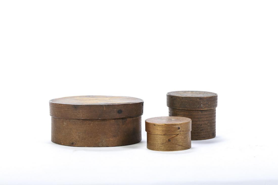 (3) ANTIQUE ROUND PANTRY BOXES: Including: 6 3/4 inch diameter with lap joints, 3 inch with finger joints, and a 3 3/4 inch with sewn lap joints.