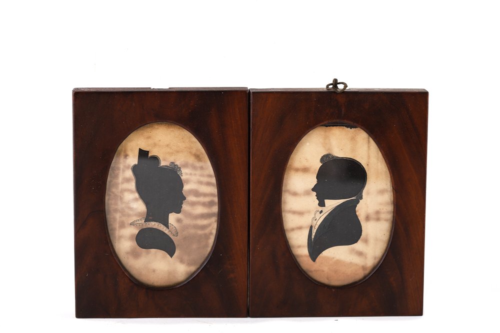 18th/19th c SILHOUETTES ATTR. TO WILLIAM CHAMBERLAIN: William Chamberlain (1790-1860). Husband and Wife, hollow-cut and embellished with pen and ink. 5 5/8 x 4 1/4 inches (overall including original frames.
