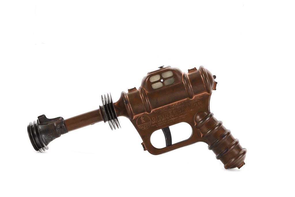 BUCK ROGERS 25TH CENTURY DISINTEGRATOR TOY GUN: Manufactured by Daisy MFG Co. Bucks Rogers 25th Century Disintegrator Pistol 9 1/4" Condition: See photos Temp No 3043