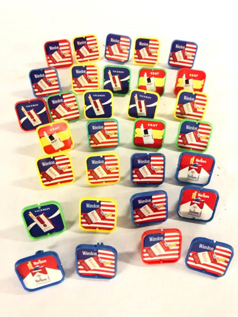 (31) PLASTIC TOBACCO TOY RINGS: Plastic rings have paper advertising labels for Winston, Viceroy, Marlboro, and Kent From the collection of former FBI agent Bill Rosenbaum. Note: We are selling only the vintage advertising, labels,