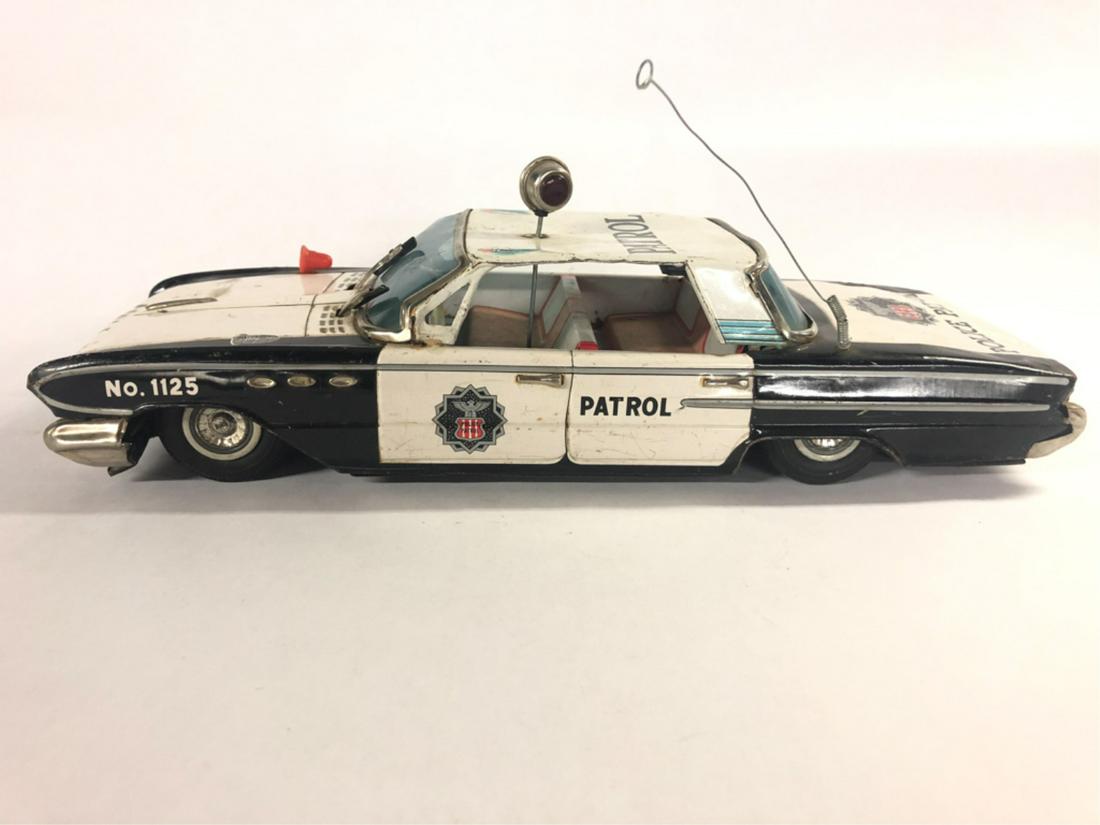 NOMURA LARGE SCALE BUICK POLICE PATROL TIN CAR (1 of 6)
