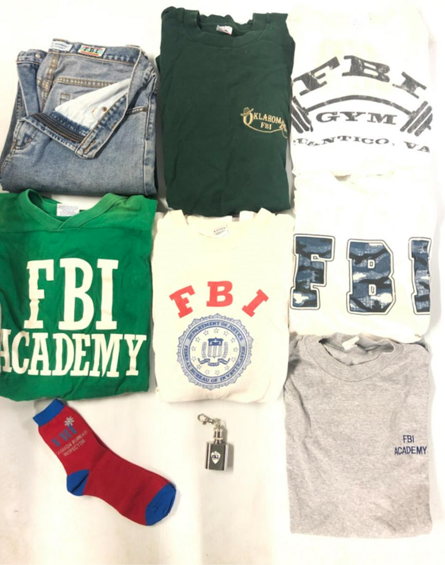 (9) PIECES FBI RELATED CLOTHING: Previously worn FBI Academy adult large grey t-shirt, Previously worn FBI Academy adult XL green jersey, Previously worn FBI "You Can Run, But You Can't Hide" adult XL white t-shirt, previously worn F