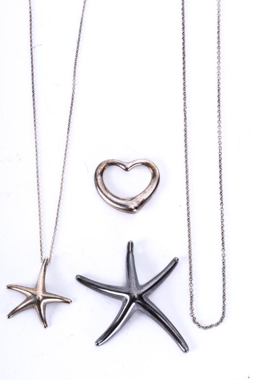 ELSA PERETTI TIFFANY and CO STERLING PENDANTS: large and small starfish, open heart and (2) chains. signed Tiffany + CO Elsa Peretti Spain. 2 1/4, 1 and 1 inches (at their largest dimension. .925. .823 troy ounces.