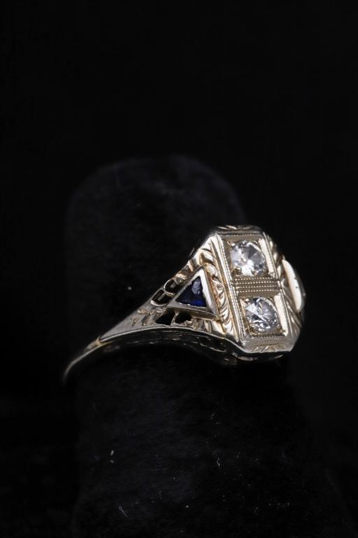 18k ART DECO WHITE GOLD RING set with DIAMONDS: And sapphire accents. 1.7 dwt.