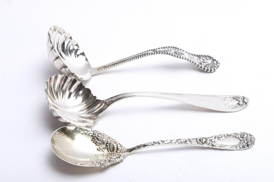 (3) ORNATE STERLING SERVING SPOONS: by Durgin, Dominick and Hall, Albert Coles. Longest 7.5 inches. approx 6.65 ozt