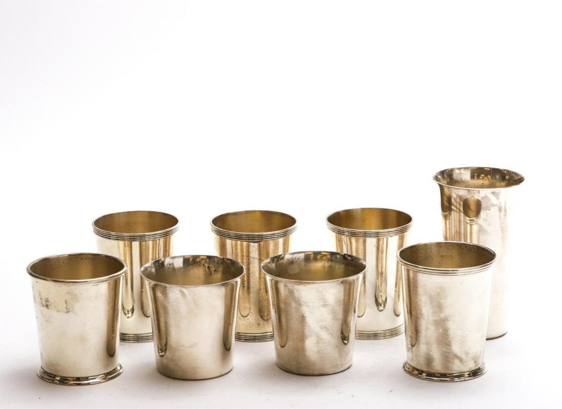 (8) STERLING SILVER MINT JULEP BEAKERS: (3) Rank Whiting, (2) Kirk and Son, (2) International and (1) taller example by Manchester Silver Co. 5 1/2 inches (and under) 32.3 troy ounces.