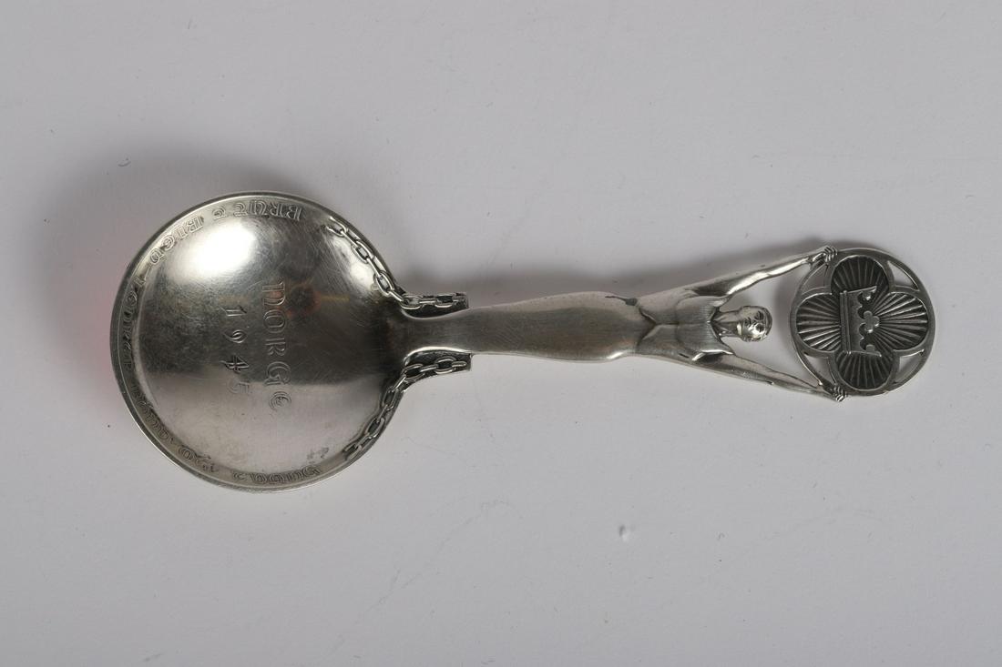 THORVALD MARTHINSEN SILVER LIBATION SPOON: Commemorating the liberation of Norway from German occupation in 1945. "NORGE 1945, BRUTT BLEV LENKER BAND OG TVANG", translated "Broken were chains, ties and constraints", a line taken from Ibsen's P
