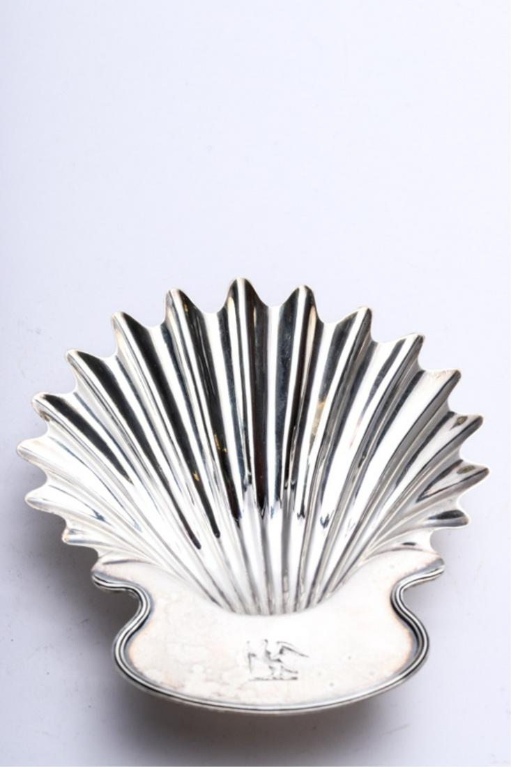 ROBERT HENNELL I STERLING SILVER SCALLOP DISH: Periwinkle shell feel. Handle engraved with an eagle. 6 x 5 inches. 3.2 troy ounces