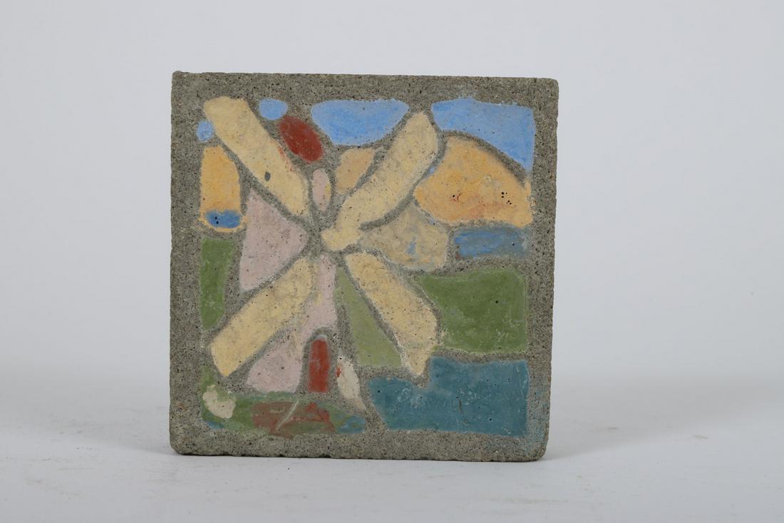 EXTREMELY RARE/ EARLY MARBLEHEAD POTTERY TILE: Stylized windmill. Glazed cement. 4 x 4 inches. Unmarked. Note: Harriett Bull’s collection of early Marblehead Pottery comes from family members directly connected to the Devereux House Sanitarium i
