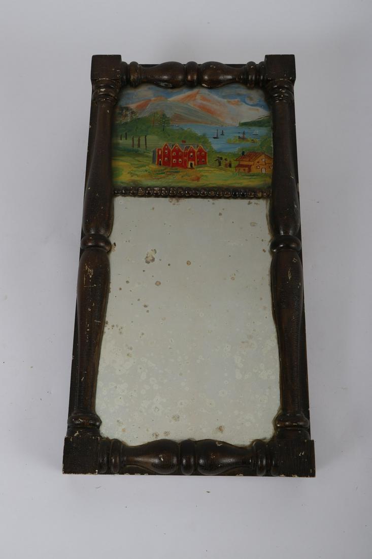 FOLKY SPLIT COLUMN MIRROR with REVERSE PAINTING: On glass depicting brick manse on a mountain lake. 17 ½ x 9 inches