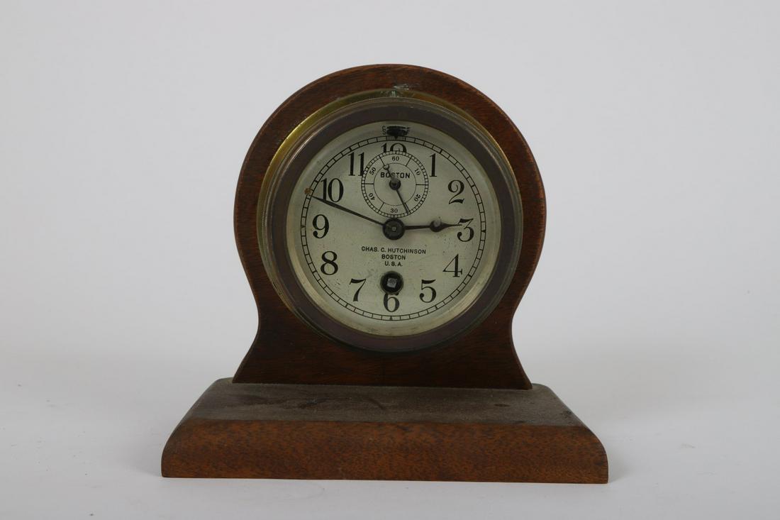 CHARLES C. HUTCHENSON BOSTON SHELF CLOCK: 2 ¾ inch dial. Mounted to a mahogany stand 5 ¾ inches