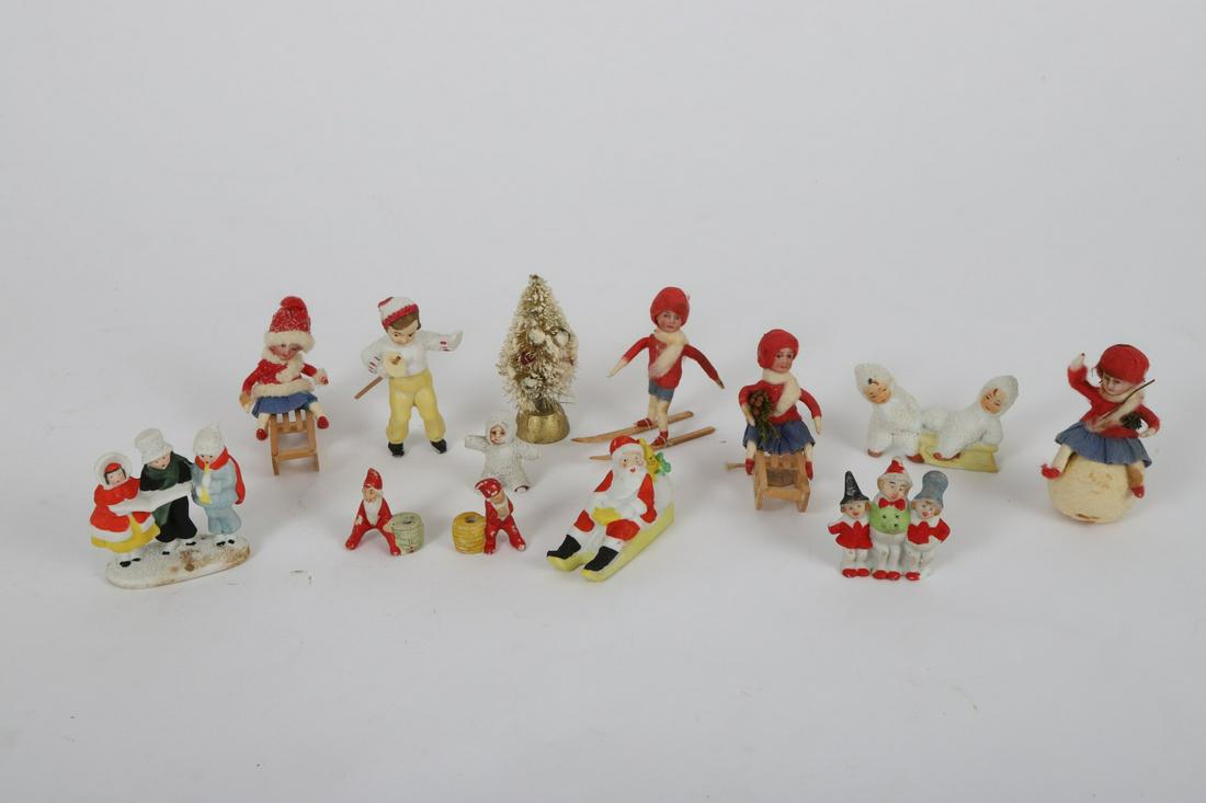 EARLY SNOW BABIES & CHRISTMAS ORINAMENTS: Probably Germany. Including: Bisque head children on skis, sleds and snow, (3) snow babies, gnomes, bisque carolers etc. 2 ½ inches (and under)