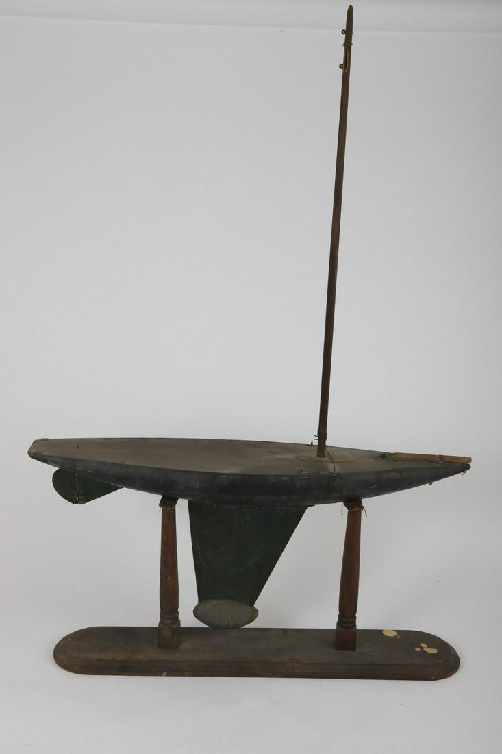 ANTIQUE REDD'S MARBLEHEAD POND MODEL: Beautifully proportioned carved and painted wood with sheet metal and lead keel. 45 x 37 ½ x 7 ¼ inches