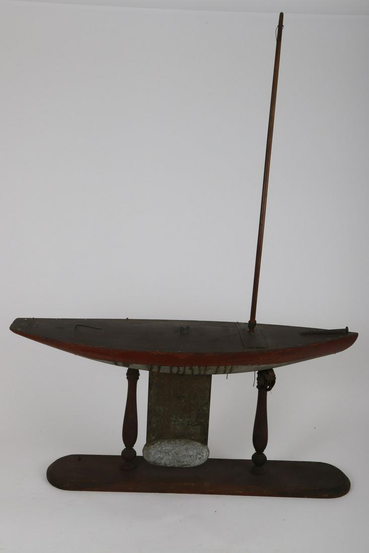 ANTIQUE REDDS POND SAILBOAT POND MODEL MARBLEHEAD: Beautifully proportioned carved and painted wood with sheet metal and lead keel. 44 ½ x 32 ½ x 9 inches (including stand)