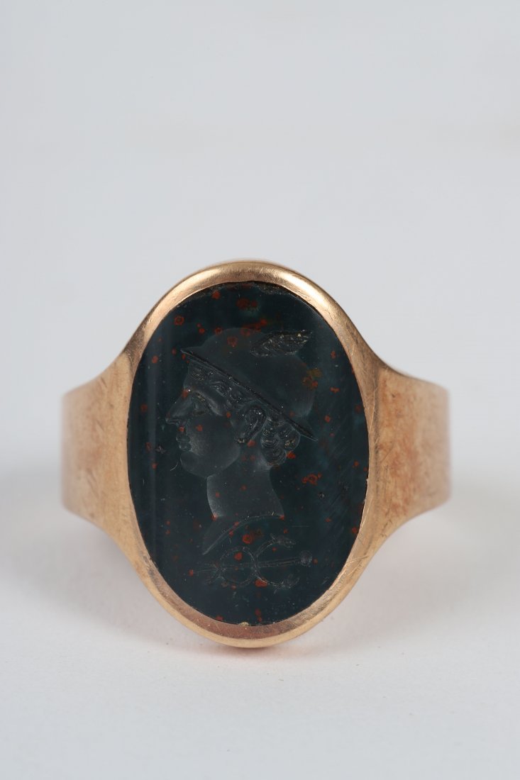 14k GOLD BLOODSTONE INTAGLIO RING with MERCURY: (19th c) Rose gold ring set with blood stone carved with Mercury. Marked 584 Fine. 6.9 dwt (total weight) Together with what appears to be its original box marked A.W. Crosby & Son BostonSize 11 (a sn