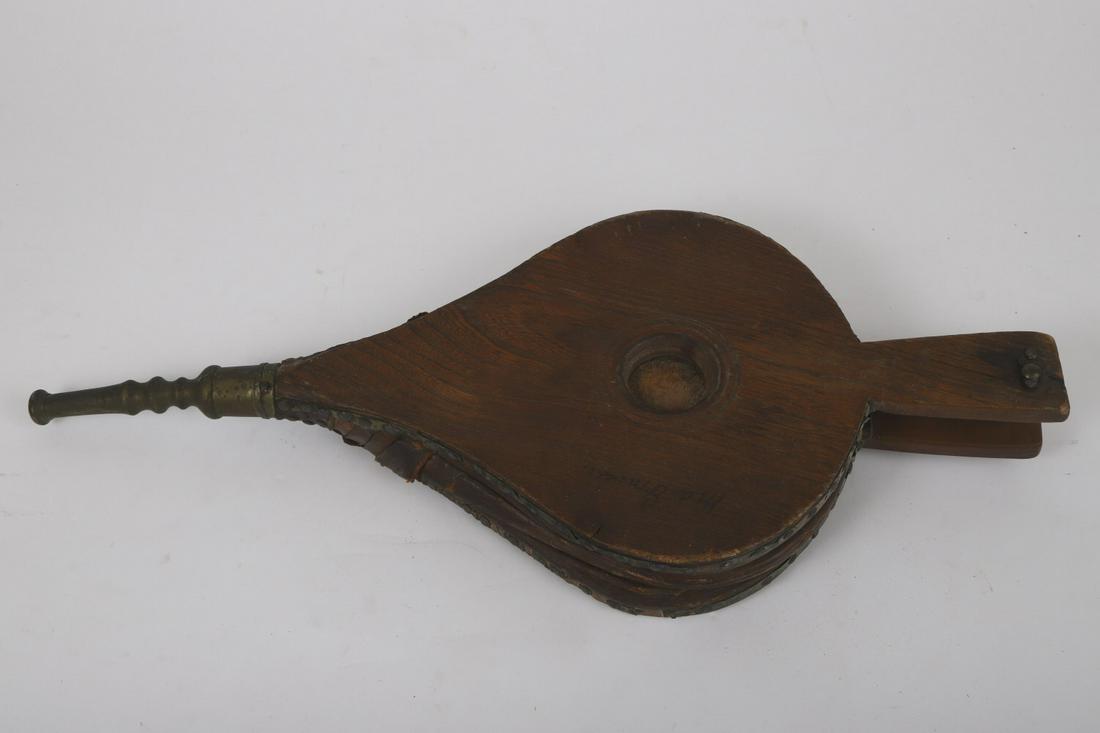 PAIR OF (18th c) “MA' GRAVES” BULLSEYE BELLOWS: Cherry front, oak back with brass nozzle. 21 inches. Note under base “John Vallison, Ma'am brought Steven's from E. India”. Note: John Vallison brought this back from ‘East India’ to Harriett