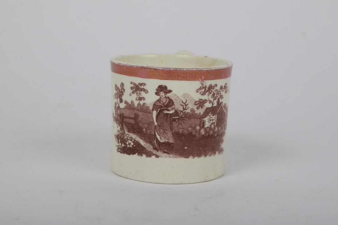 STAFFORDSHIRE TRANSFERWARE JUVENILE CUP: Pink luster rim with figural rural scene. 2 3/8 inches