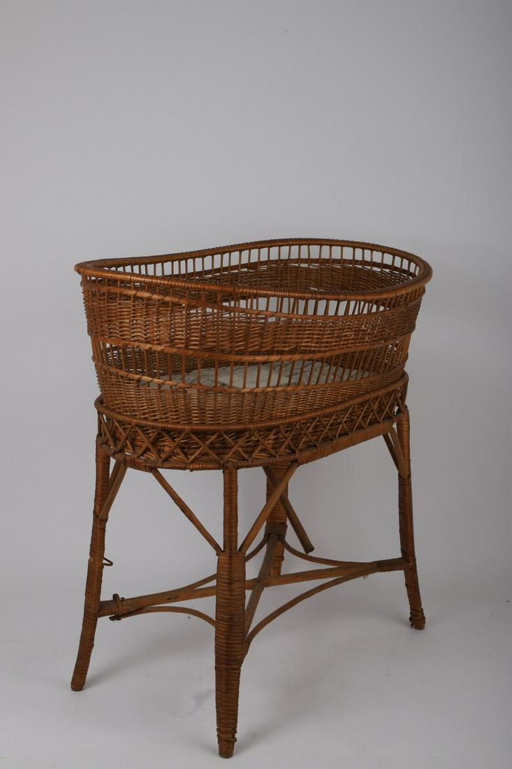 ANTIQUE WICKER BASKET on STAND: Cute size with versatile uses. Oval basket is removable. 25 x 25 x 15 ½ inches.