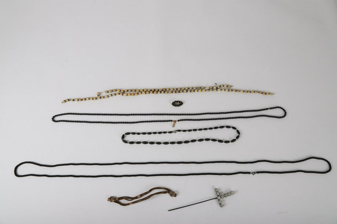GROUPING OF VICTORIAN JEWELRY: Including: Rhinestone hat pin 6 inches, choker with gold filled ties and bezels set with moonstones? 13 inches. Black beaded brooch and (4) beaded necklaces 62 inches (and under)