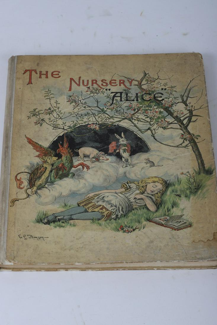 SCARCE -"THE NURSERY “ALICE”" by CARROLL 1890: Containing Twenty Coloured Enlargements from Tenniel's Illustrations. Cover by E. Gertrude Thomson: Macmillan & Co., London 1890. hardcover paper bound