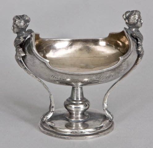 Silver master salt. The oval shaped bowl on a turn