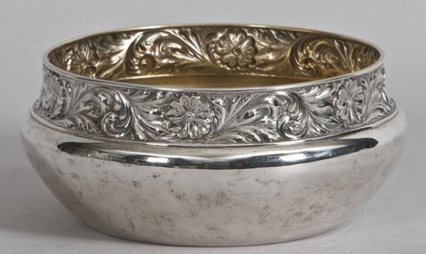 American silver bowl, George W. Sheibler Co. NY, N: American silver bowl, George W. Sheibler Co. NY, NY circa 1876-1910, retailed by Bigelow, Kennard & Co. The bowl with embossed neck of scrolls and flowers and gilt interior, 15 oz. Height: 3 1/2 in. D
