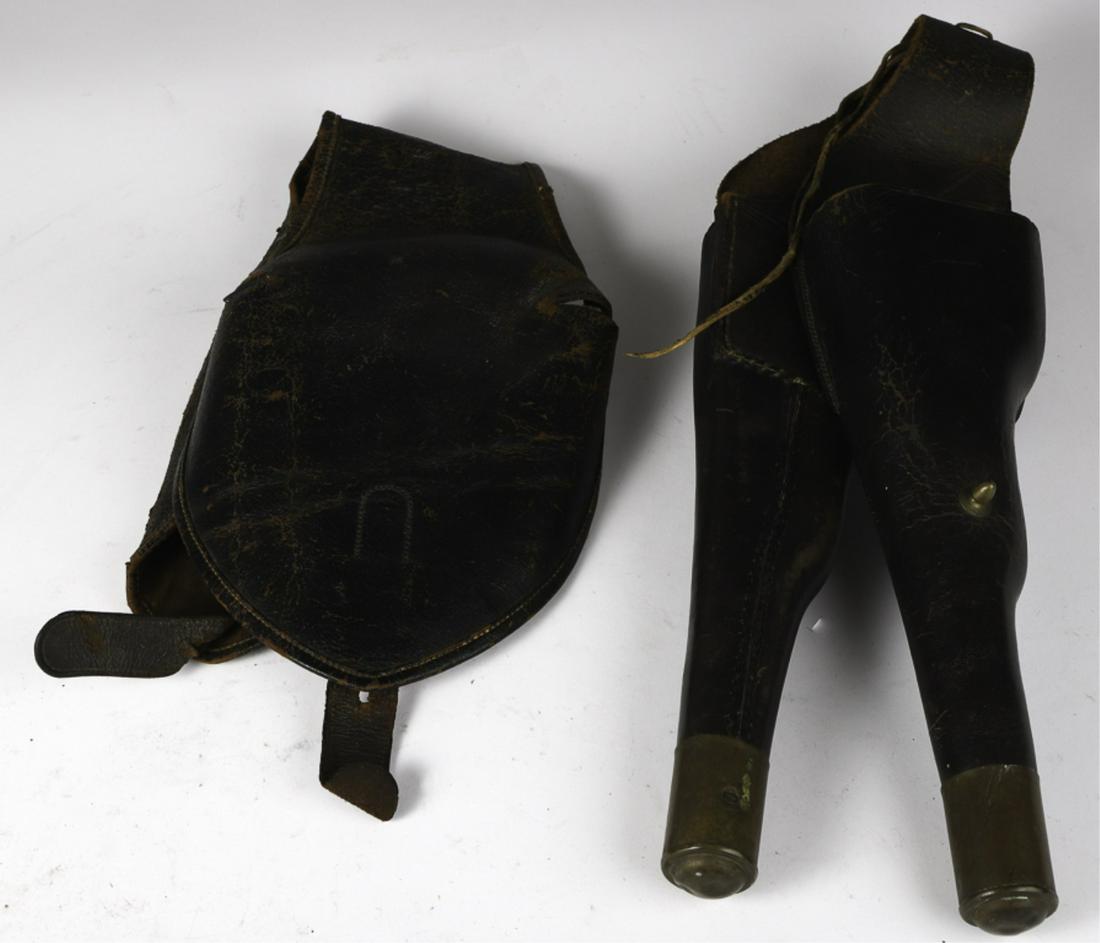 CIVIL WAR ERA DOUBLE POMMEL HOLSTER: Leather with brass end caps. 19 inches. Unmarked