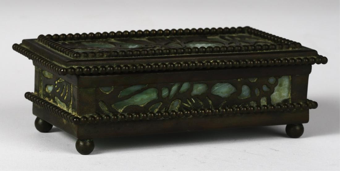 RIVIERE STUDIOS BRONZE and SLAG GLASS STAMP BOX: Signed. 1 1/2 x 4 3/4 x 2 3/4 inches.