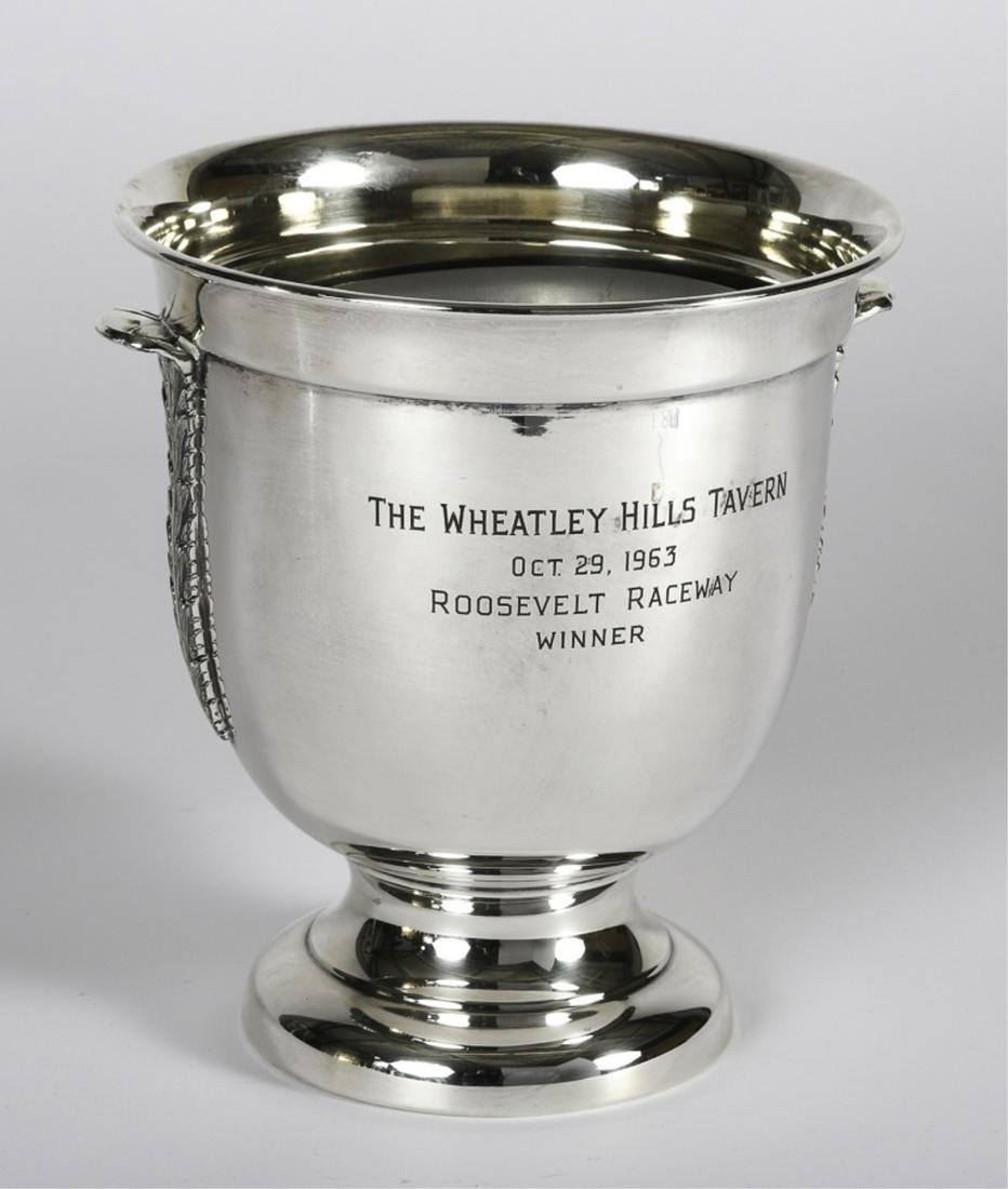 1963 WHEATLEY HILLS TAVERN ROOSEVELT RACEWAY: October 29, 1963. "Winner" Sheffield footed trophy with acanthus leaf form handles. silver plated 9 inches.